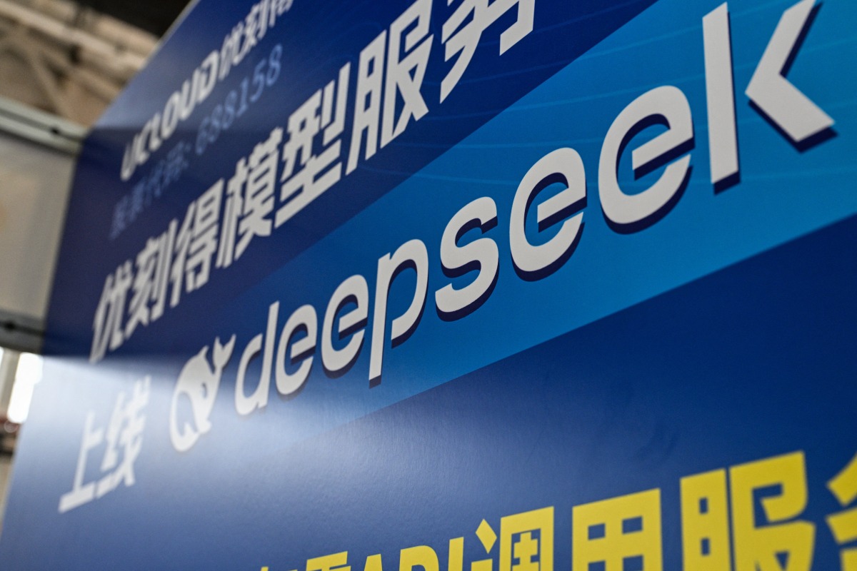 The logo of Deepseek is seen during the Global Developer Conference, organised by the Shanghai AI Industry Association, in Shanghai on February 21, 2025. Photo by Hector RETAMAL / AFP