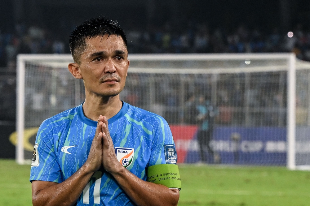 India's captain Sunil Chhetri greets his fans at the end of the FIFA World Cup 2026 Asia qualifier match between India and Kuwait at the Salt Lake Stadium in Kolkata on June 6, 2024. (Photo by Dibyangshu Sarkar / AFP)
