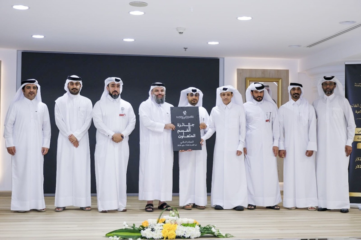 Undersecretary of the Ministry of Awqaf and Islamic Affairs H E Dr. Sheikh Khalid bin Mohammed bin Ghanem Al Thani (fourth left) with other officials at the event. 
