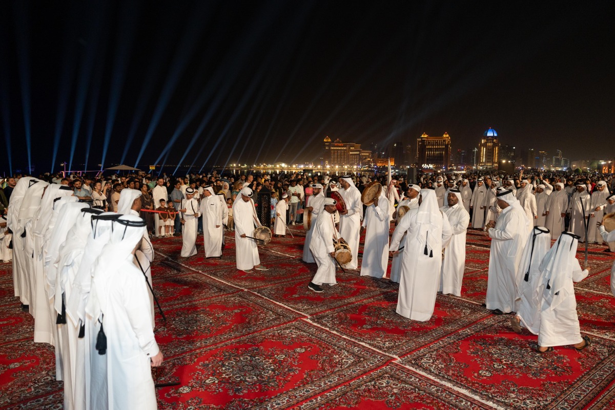 A traditional troupe performs as part of Eid Al-Adha celebrations at Katara yesterday.