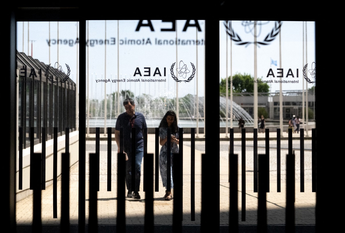 Photo used for representational purposes. People arrive at the International Atomic Energy Agency (IAEA) during a Board of Governors meeting held behind closed doors in Vienna, Austria on June 13, 2025. Photo by Joe Klamar / AFP.
