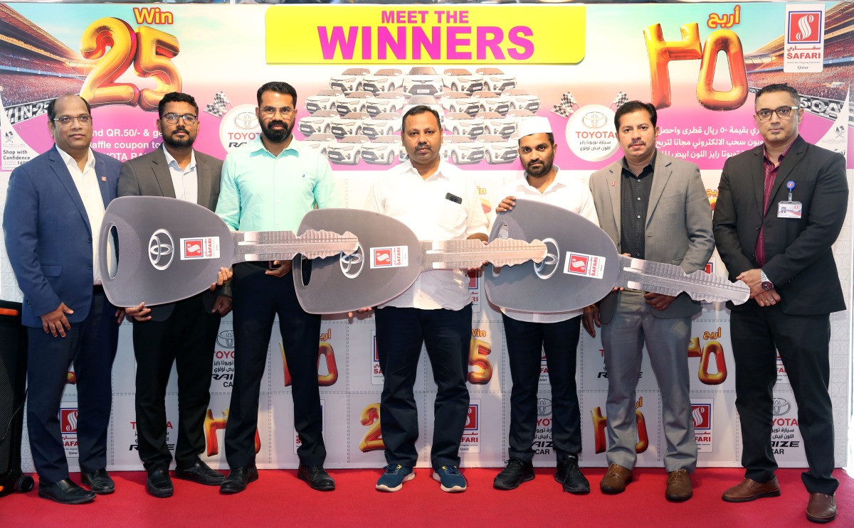 Safari officials with the mega promotion winners.