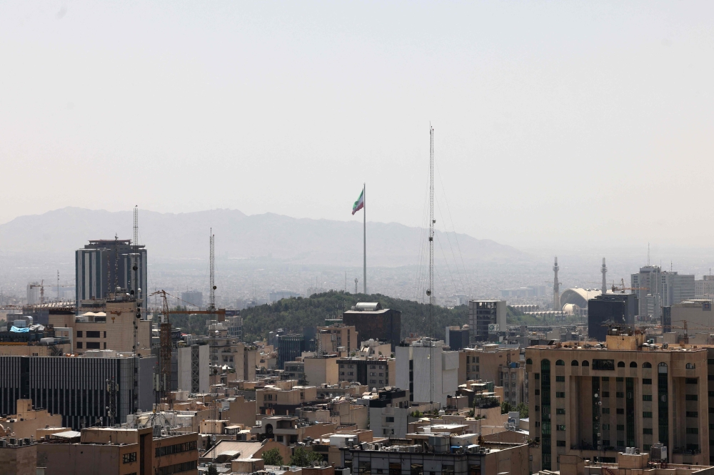 This picture shows a general view of Iran's capital Tehran on June 16, 2025. (Photo by Atta Kenare / AFP)