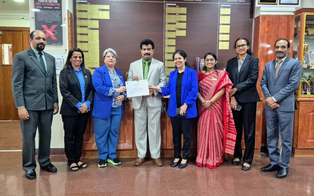  School officials with the award.