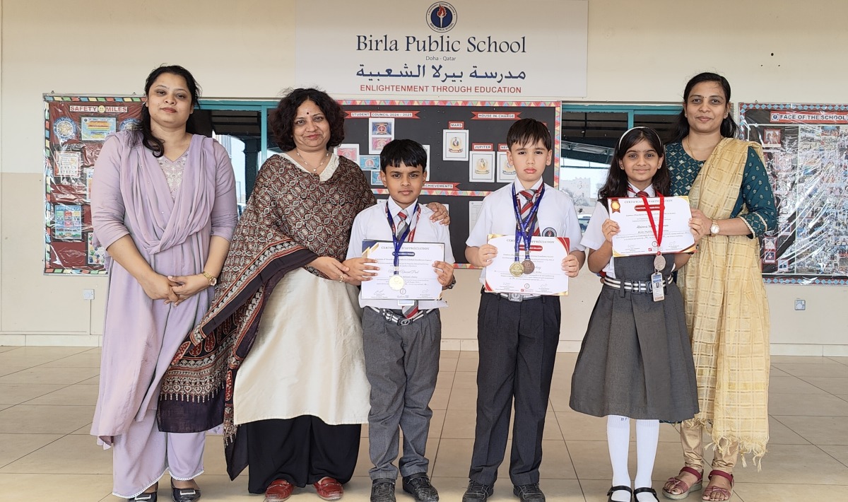  BPS staff and students with the certificates from the exams.