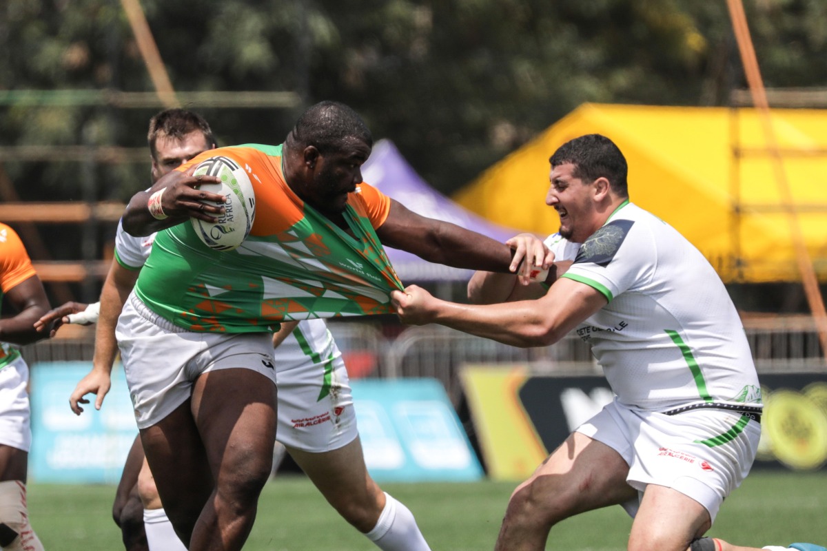 Mehdi Slamani (R) of Algeria vies with Boris Diomande of Cote d'Ivoire during a match at the Rugby Africa Cup Championship 2025 in Kampala, Uganda, July 8, 2025. (Photo by Hajarah Nalwadda/Xinhua)
 