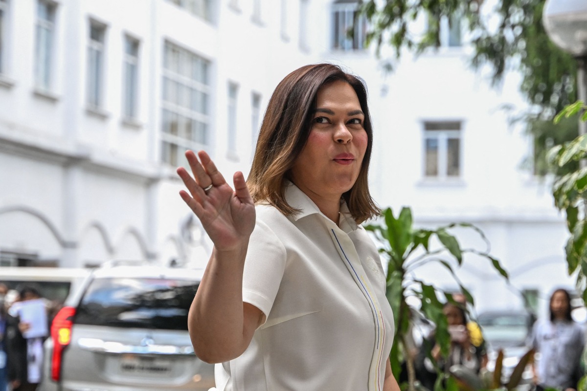 Philippine Vice President Sara Duterte arrives to file her counter affidavit in response to the National Bureau of Investigation (NBI) complaint over her alleged threat to Philippine President Ferdinand Marcos Jr, at the Department of Justice in Manila on May 9, 2025. Photo by Jam STA ROSA / AFP