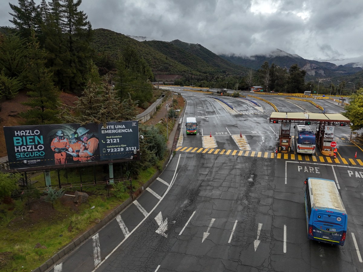 Aerial view of the entrance to the El Teniente mine, a Codelco copper mine in the commune of Machali, near Rancagua, O'Higgins Region, Chile, on August 1, 2025. (Photo by Raul Bravo / AFP)
