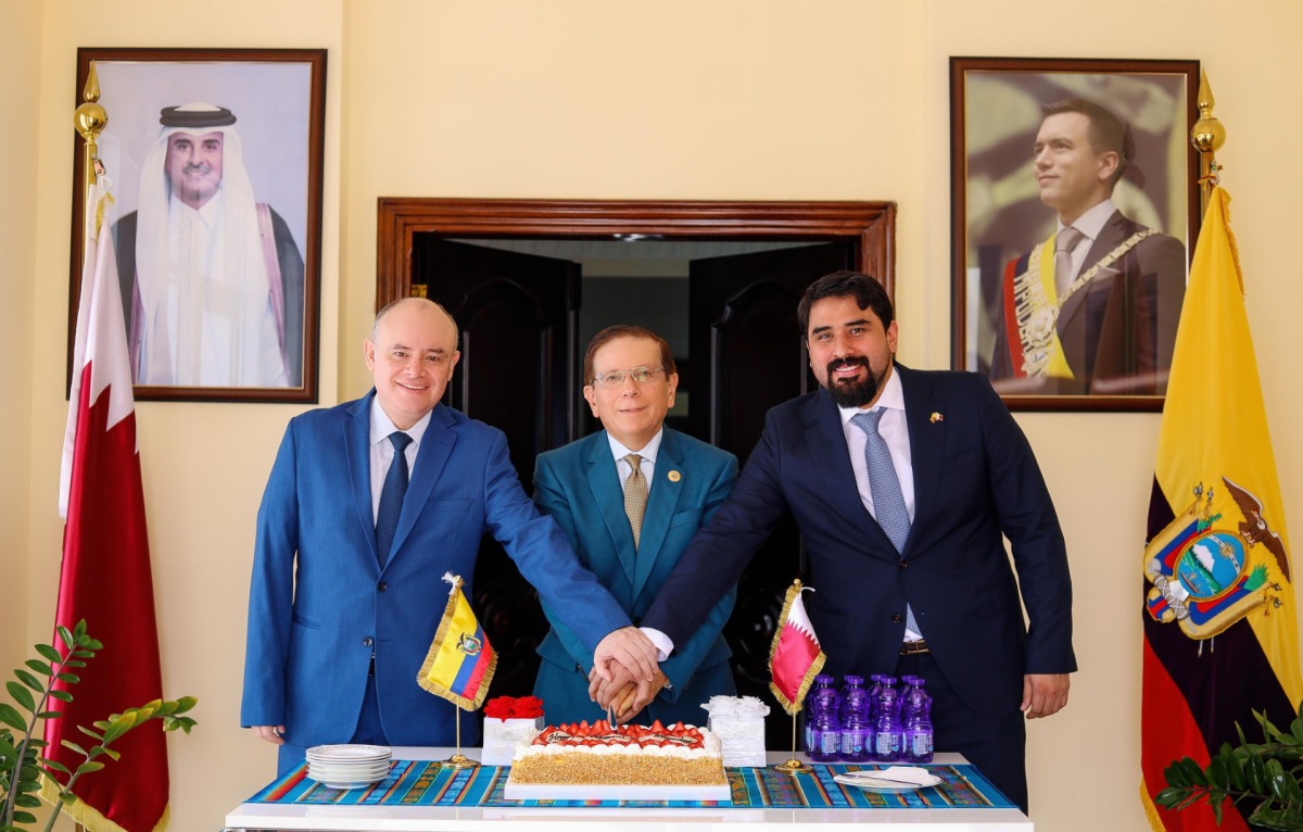 Ecuadorian Ambassador to Qatar, H E Pascual Del Cioppo (centre), together with other officials, cutting a cake to mark Ecuador’s 216th independence anniversary.