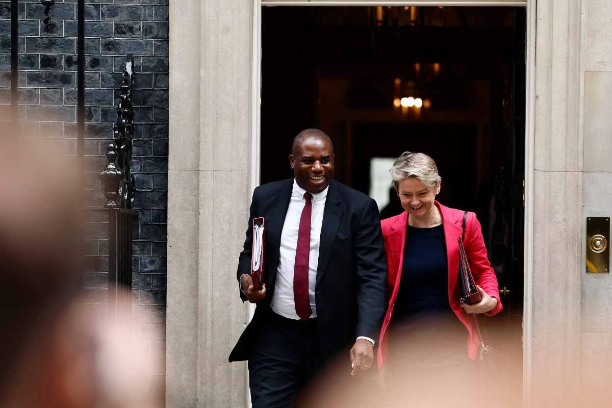 (FILES) Britain's Foreign Secretary David Lammy (L) and Britain's Home Secretary Yvette Cooper leave after attending a Cabinet meeting at 10 Downing Street in London on July 23, 2024. (Photo by BENJAMIN CREMEL / AFP)
