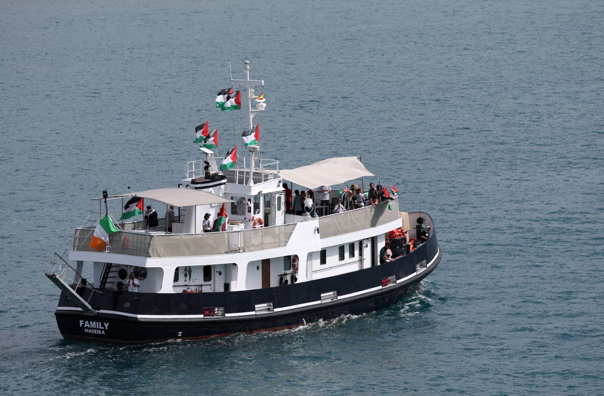 A boat carrying Swedish climate activist Greta Thunberg and activists, part of a civilian flotilla aiming at breaking the Israeli blockade of the Gaza Strip, leaves the port of Barcelona, on August 31, 2025. (Photo by Lluis GENE / AFP)
