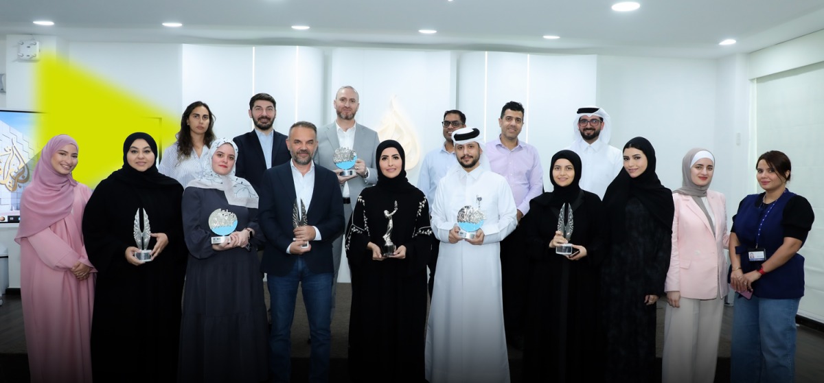  Al Jazeera Media Institute staff with the awards.