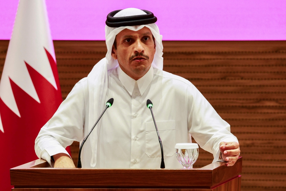Qatar's Prime Minister and Foreign Minister Mohammed bin Abdulrahman al-Thani addresses a press conference following Israeli strikes in Doha on September 9, 2025. (Photo by Karim Jaafar / AFP)