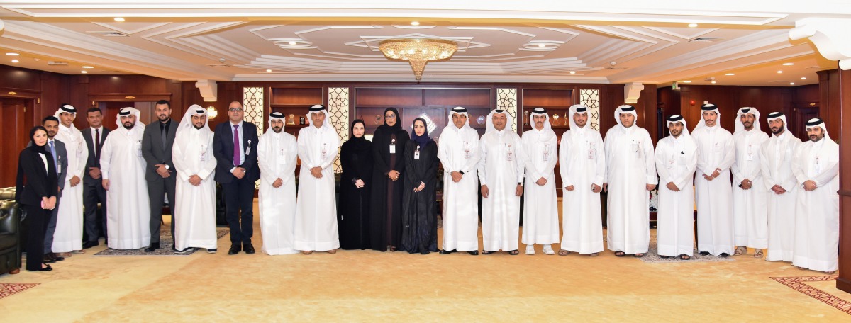 QIIB Chief Executive Officer Dr. Abdulbasit Ahmad Al-Shaibei with new group of employees.