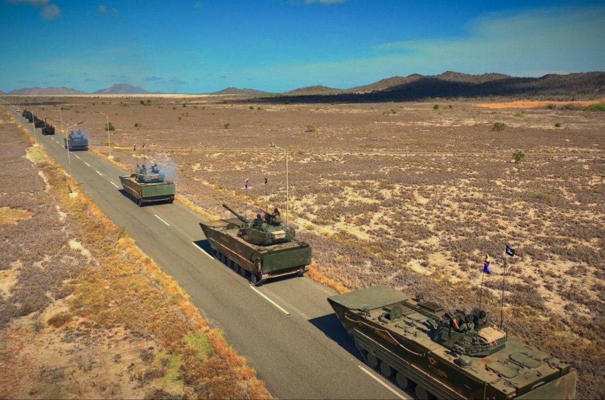 This handout picture released on September 18, 2025, by the CEOFANB (Strategic Operations Command of the Bolivarian National Armed Forces of Venezuela) shows a Venezuelan Navy VN16 tanks during military exercises on the Caribbean island of La Orchila, Venezuela. (Photo by Handout / CEOFANB / AFP)
