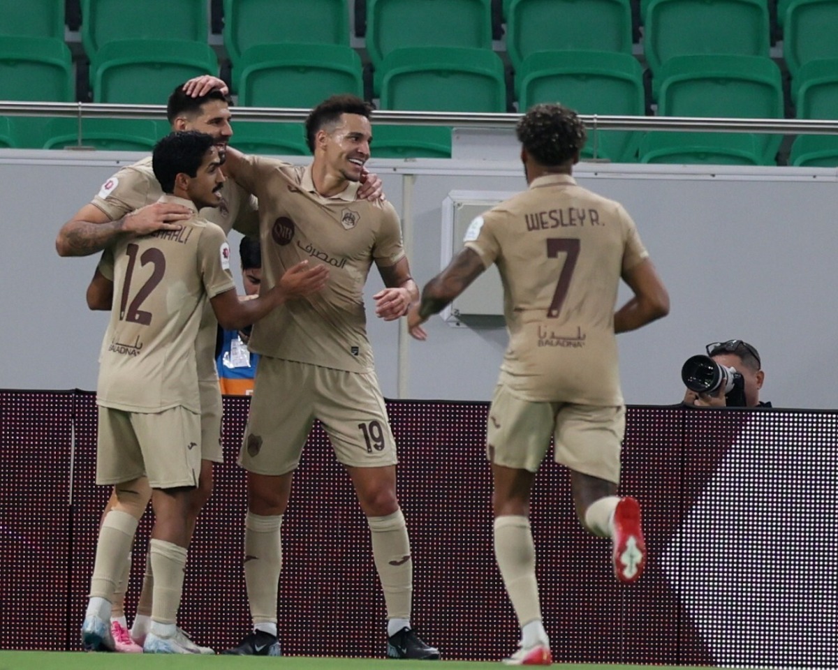 Rodrigo Moreno (second right) celebrates with teammates after scoring Al Rayyan's first goal.
