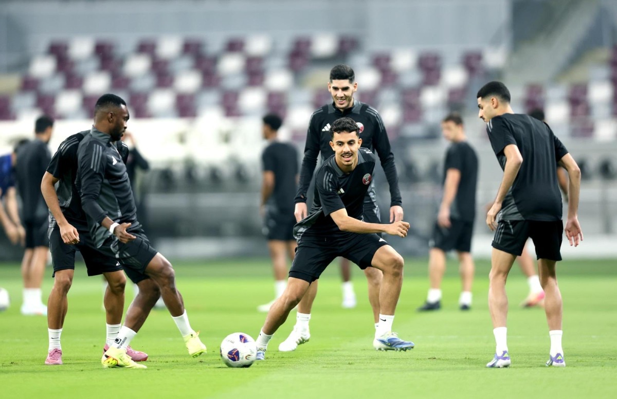 Qatar players take part in a training session. 