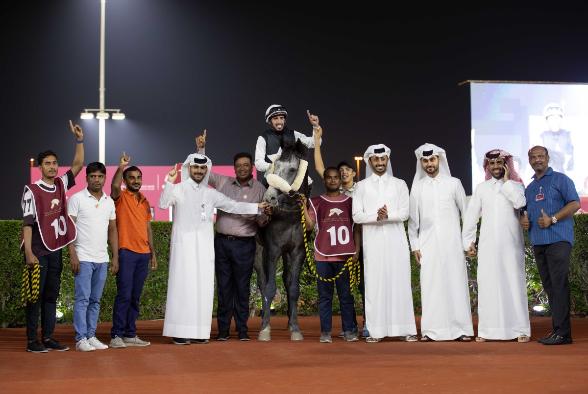 The connections of Mohtaram celebrate their victory. Photo: Juhaim/QREC