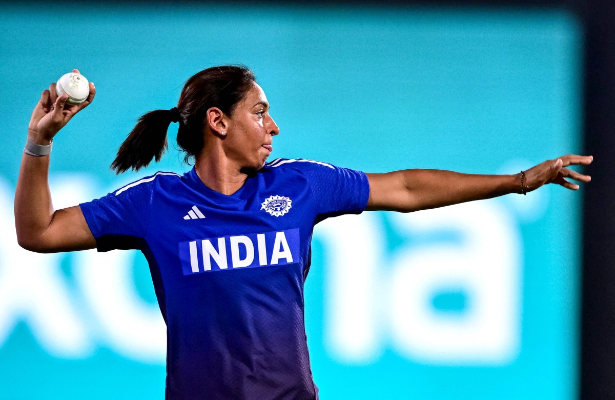FILES) India's captain Harmanpreet Kaur attends a practice session at the Barsapara Cricket Stadium in Guwahati on September 29, 2025, on the eve of their 2025 ICC Women's Cricket World Cup one-day international (ODI) match against Sri Lanka.  (Photo by Biju BORO / AFP)