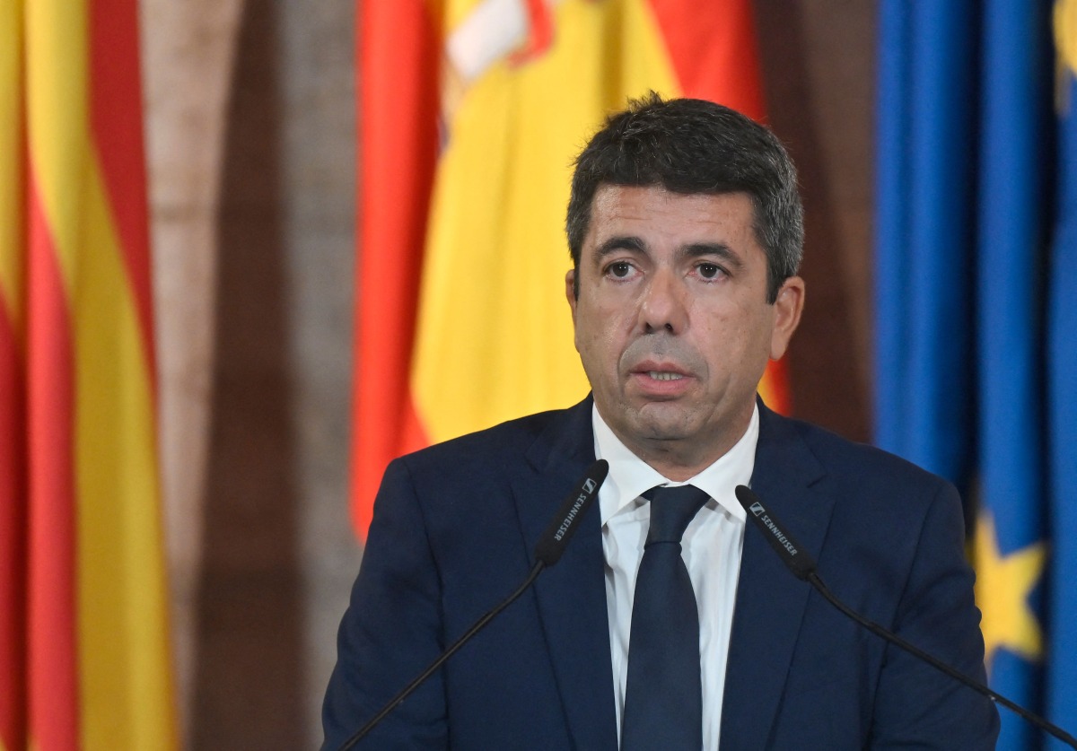 President of Valencia's Region Carlos Mazon gives a press conference to announce his resignation at Valencia's Palau de la Generalitat on November 3, 2025. Photo by Jose JORDAN / AFP