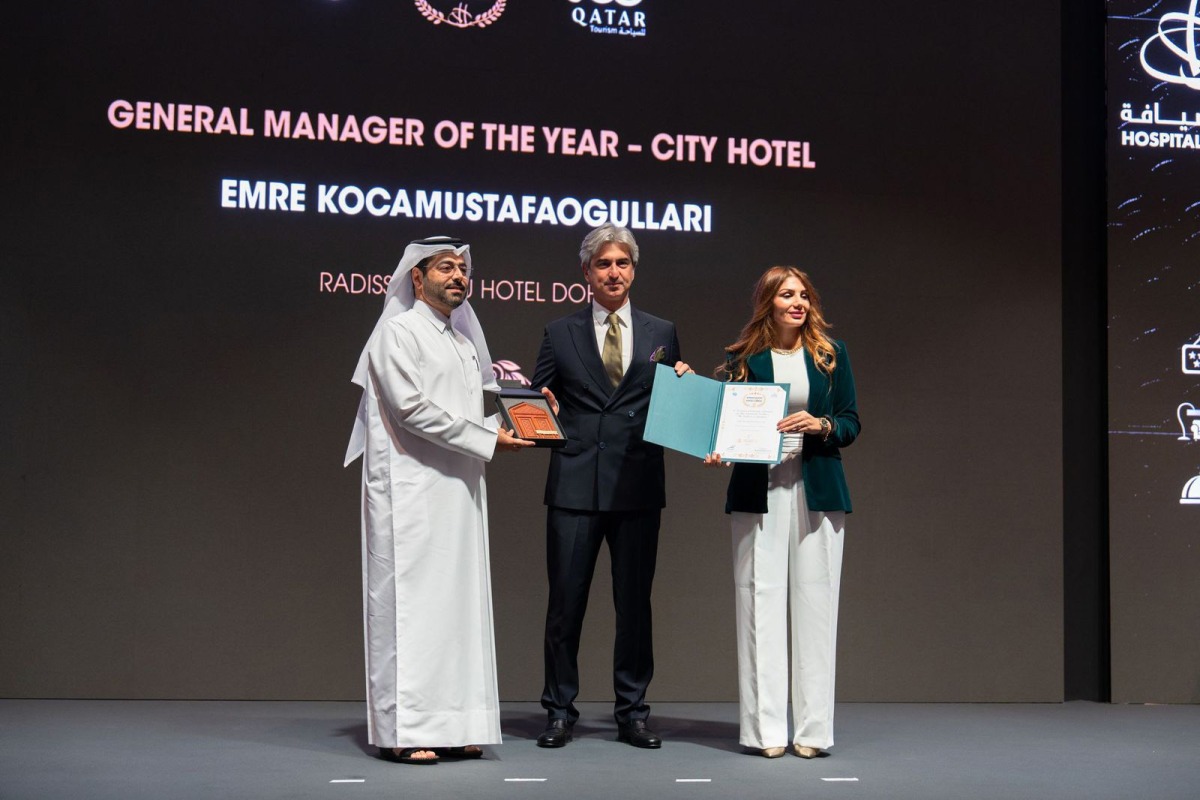 Radisson Blu Hotel, Doha General Manager, Emre Kocamustafaogullari receiving the award during the event.