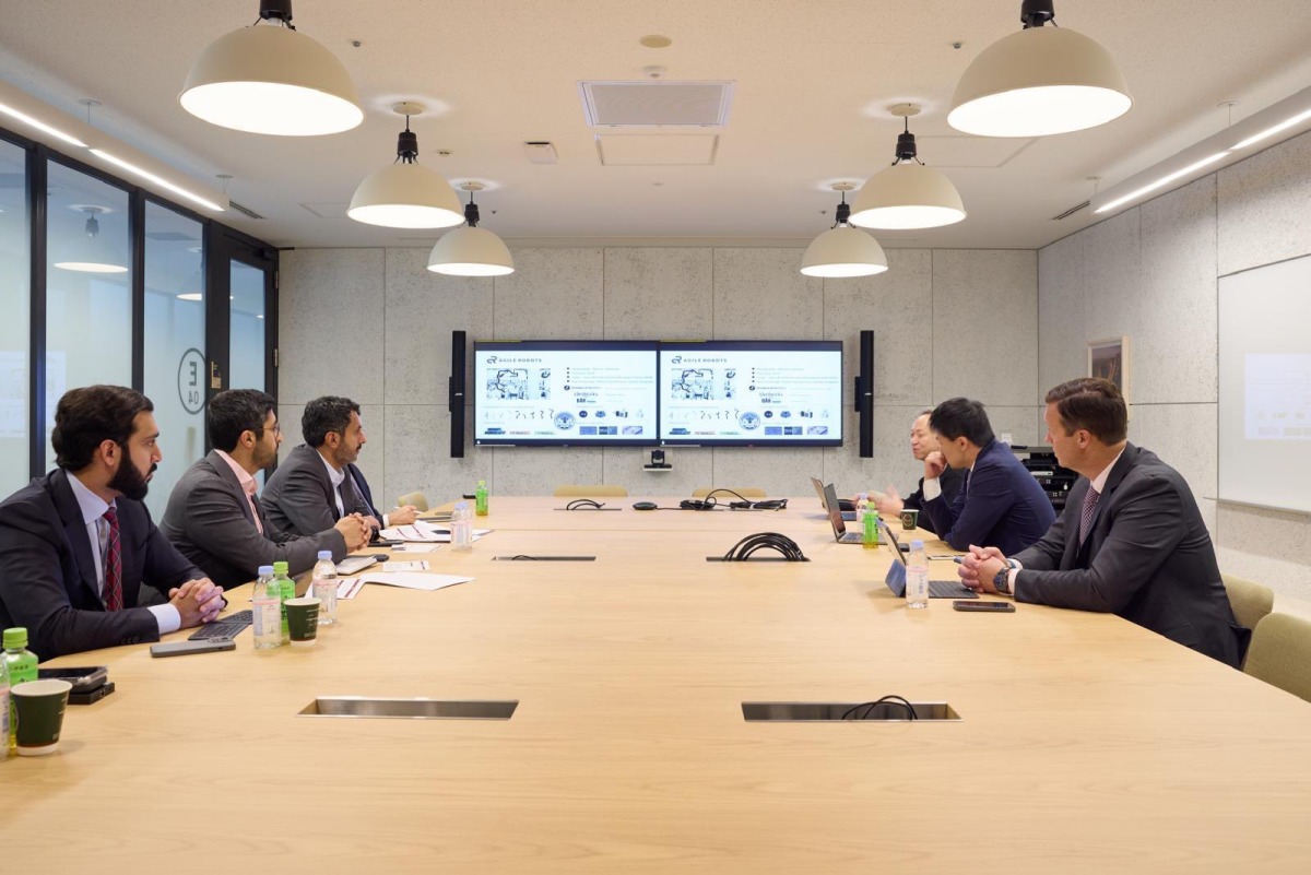 Minister of Commerce and Industry H E Sheikh Faisal bin Thani bin Faisal Al Thani with other officials during the meeting.