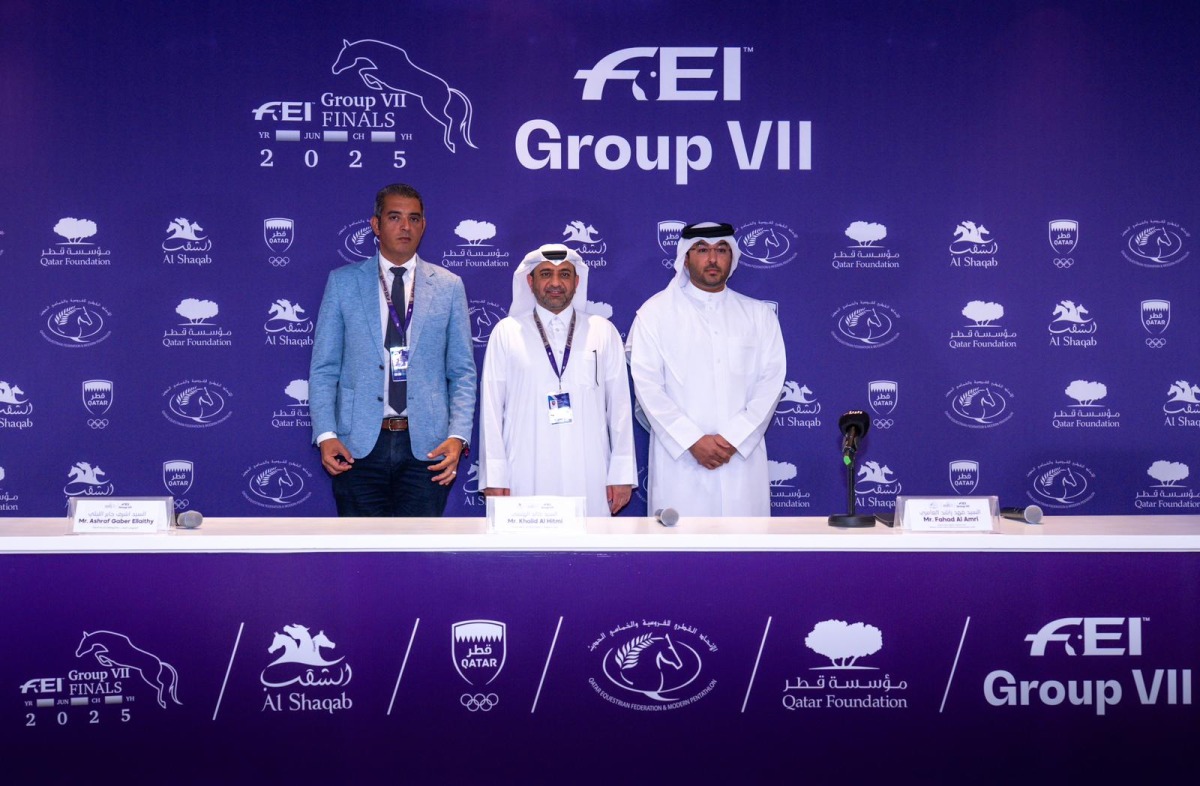 Event Director Khalid Al-Hitmi poses for a photo along with other officials. 