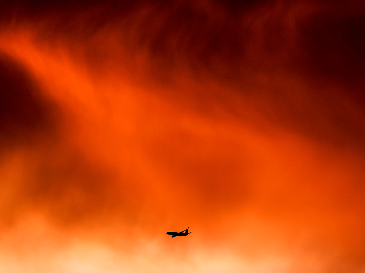 Australian firefighters battle multiple blazes in worst heatwave since 2009