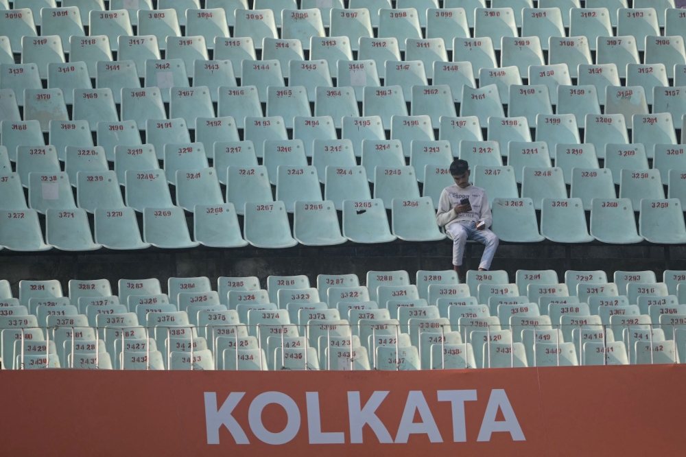Empty stands are seen during the 2026 ICC Men's T20 Cricket World Cup group stage match between Scotland and West Indies at the Eden Gardens in Kolkata on February 7, 2026. (Photo by Dibyangshu Sarkar / AFP)