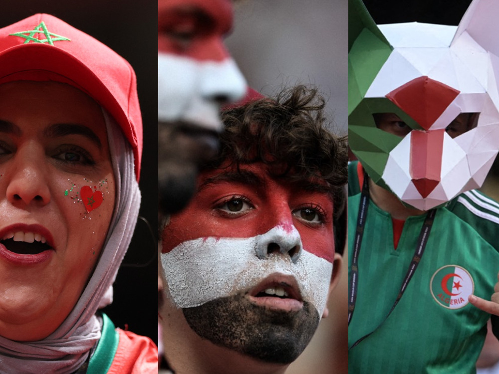 Combination photo showing fans of Morocco (L), Egypt (C) and Algeria (R) at the FIFA World Cup. AFP.
