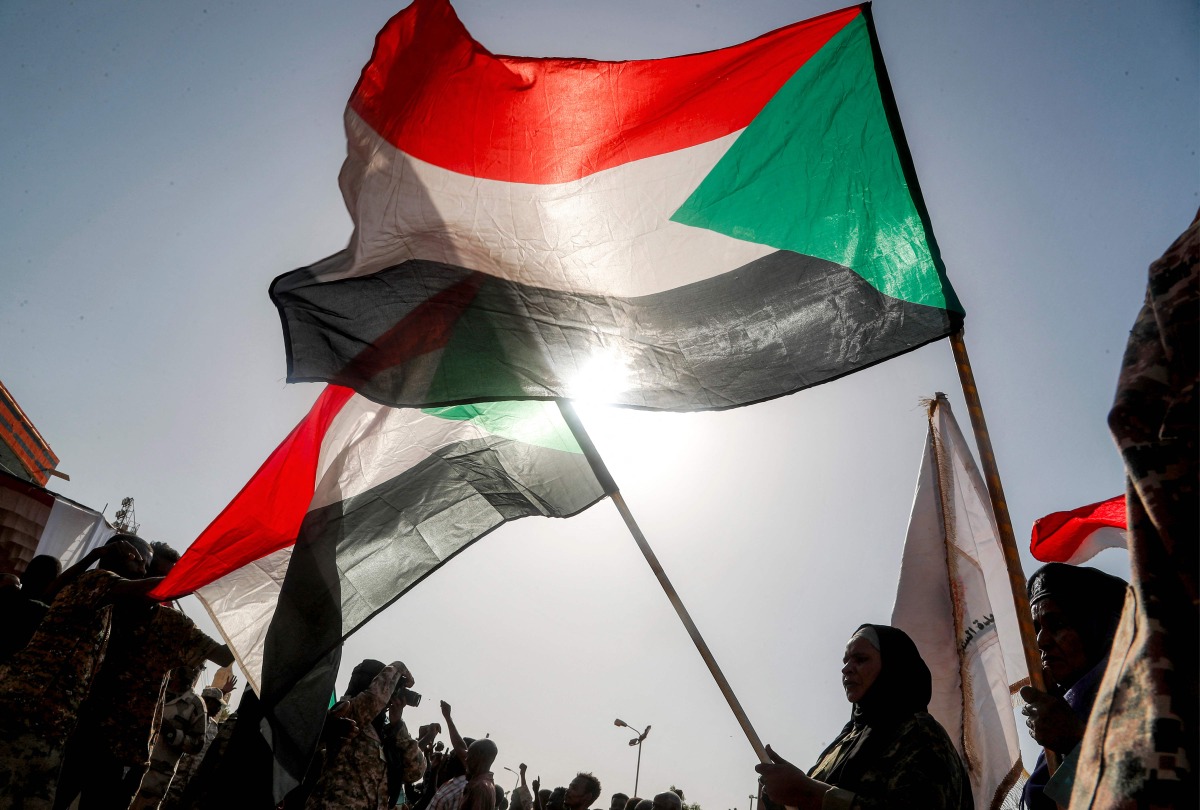 Members of the pro-Sudanese army popular resistance group gather for a rally supporting the army position in Darfur, Kordofan, and the Blue Nile State, in the Karary district of Omdurman, the twin-city of Sudan's capital, on June 30, 2026. (Photo by Ebrahim HAMID / AFP)