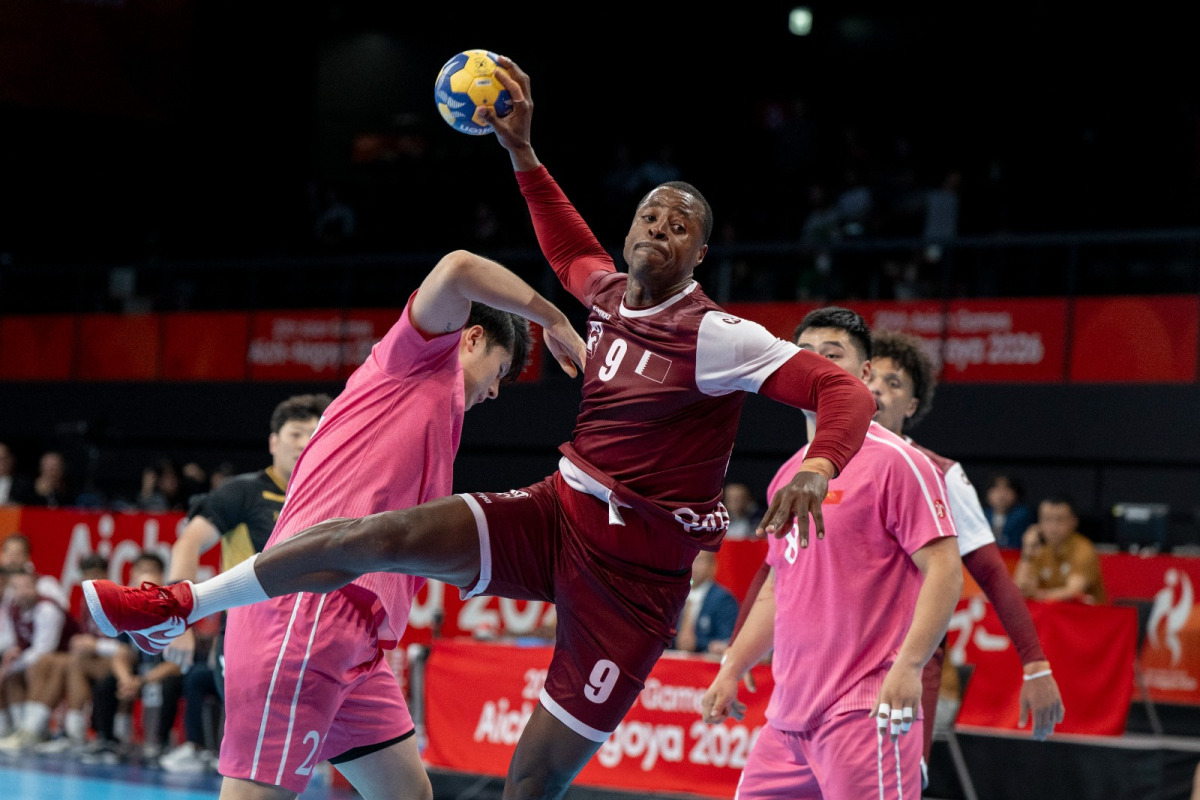 Action during the men's handball match between Qatar and China.